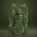 Rear studio view of the green resin Laughing Buddha with raised ingots