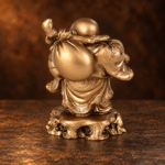 Rear studio view of the bronze-colored resin Laughing Buddha with shoulder sack and cloud base